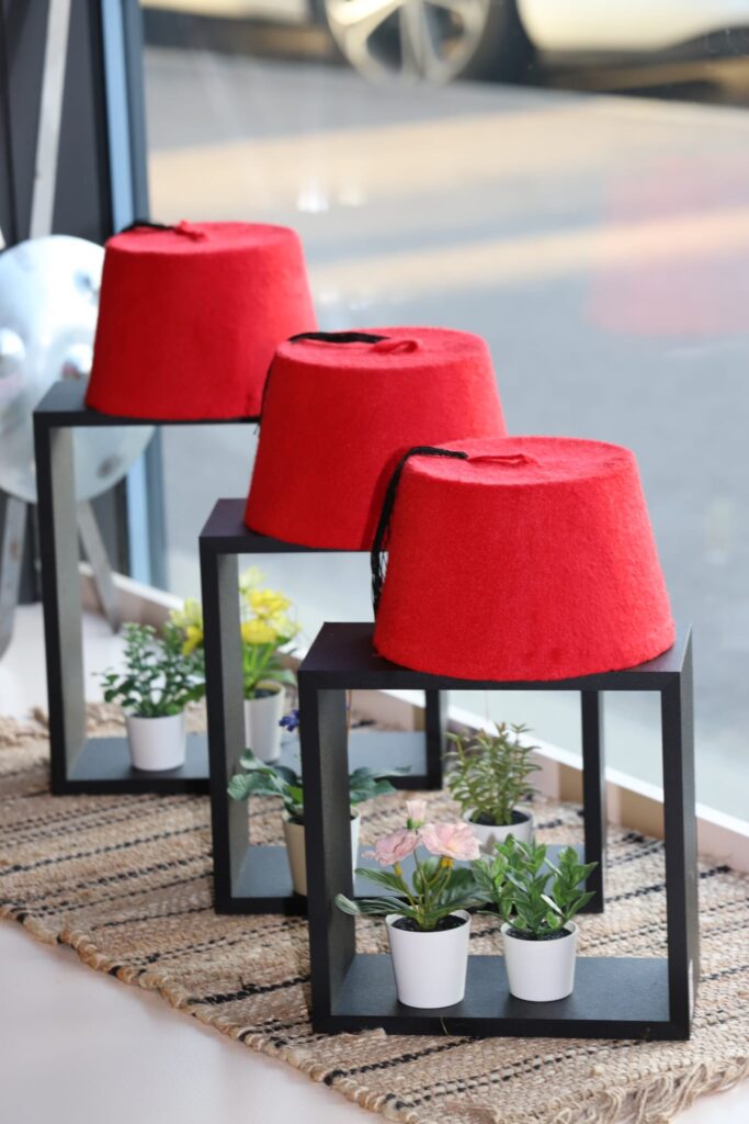 traditional hat displayed on a window of the tarbouch restaurant